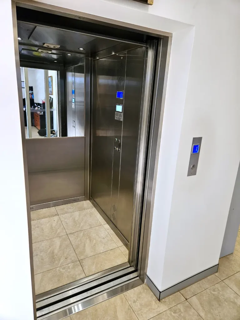 Home lift doors open mirror